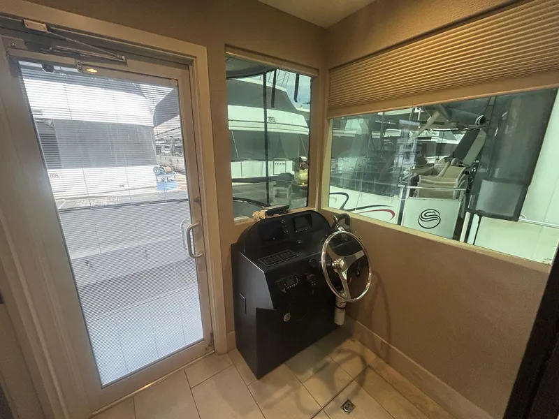 Slide: The Image of Control room of Adonia Traditions 6 shares, 2020 model, with steering wheel and windows. - 5