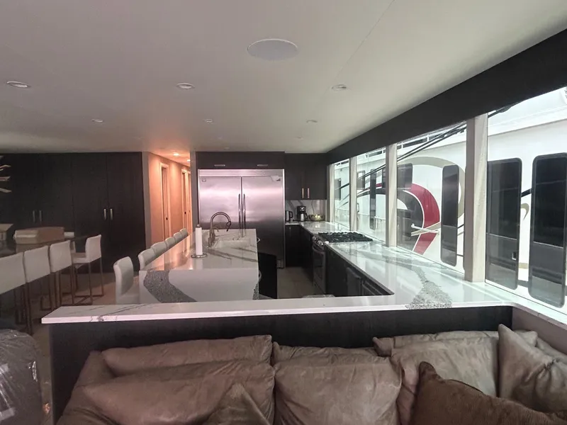 Slide: The Image of Luxurious Adonia Traditions 6 shares 2020 kitchen with modern appliances and sleek design. - 8