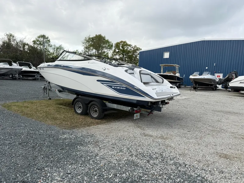 Slide: The Image of 2020 Yamaha Boats SX240 on trailer in outdoor storage area. - 3