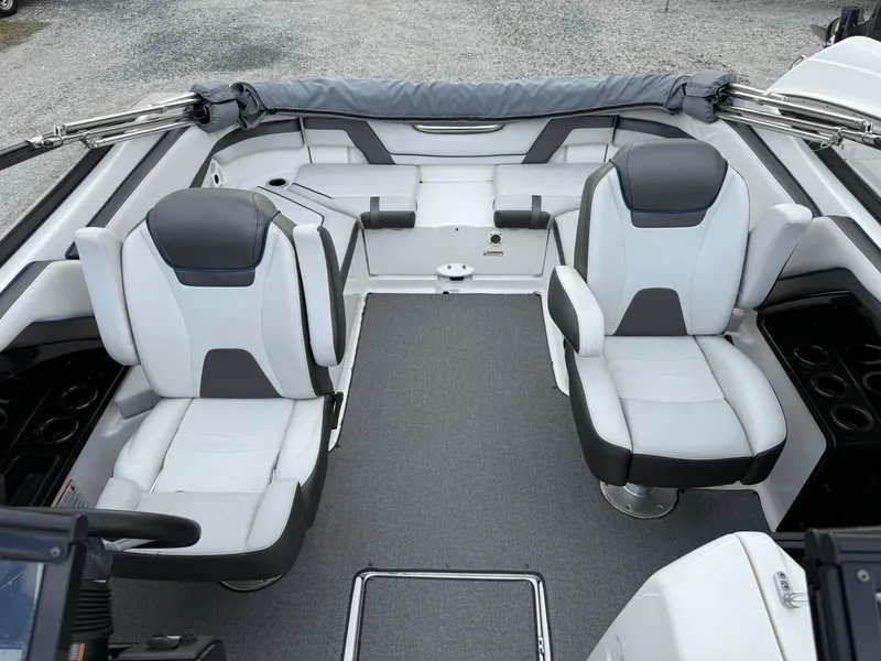 Slide: The Image of 2020 Yamaha Boats SX240 interior with two cushioned seats and a spacious layout. - 9