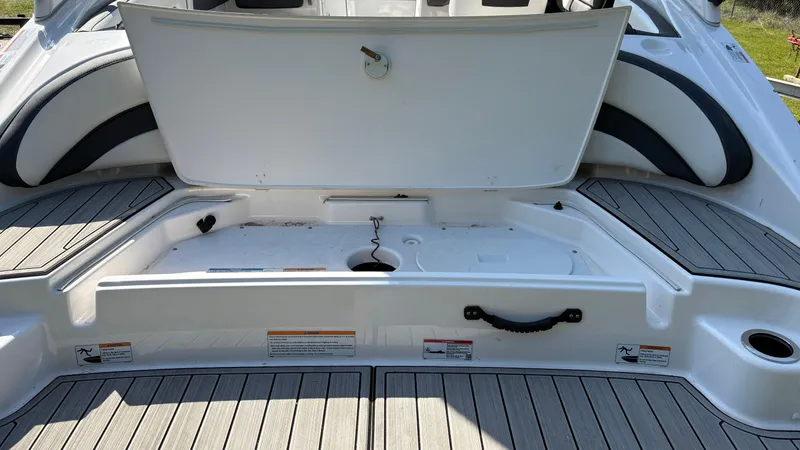 Slide: The Image of Close-up of Yamaha AR195 2024 boat's exhaust pipe with coiled wire inside. - 21