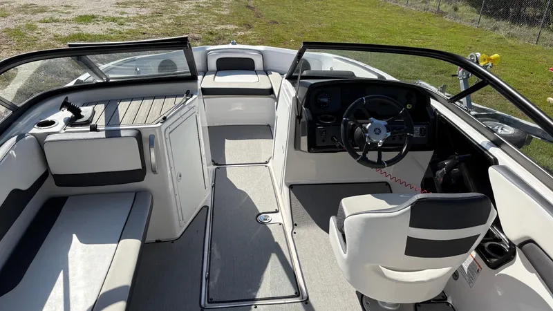 Slide: The Image of 2024 Yamaha Boats AR195 interior with sleek seating and modern design. - 25