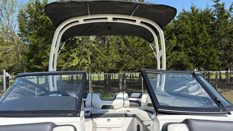 Slide: The Image of 2024 Yamaha Boats AR195 interior with seating and steering wheel, viewed from above. - 28