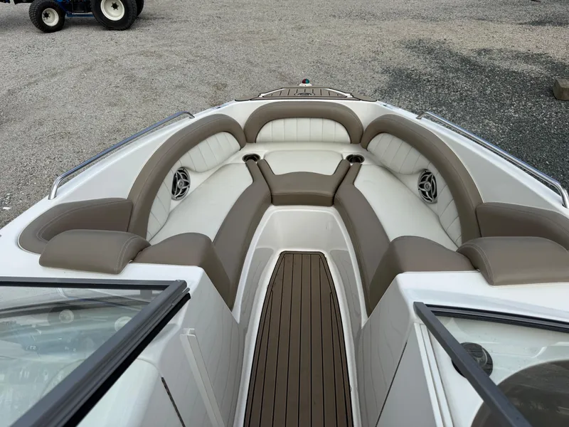 Slide: The Image of 2008 Yamaha Boats 232 Limited interior with cushioned seating and sleek design. - 4