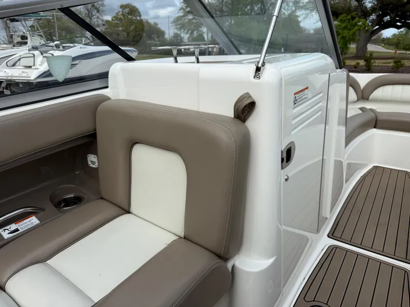 Slide: The Image of 2008 Yamaha Boats 232 Limited interior with beige and white seating, showcasing luxury and comfort. - 6