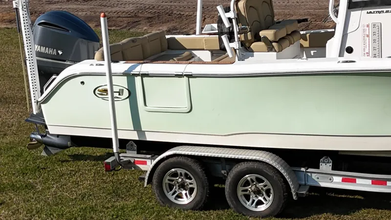 Slide: The Image of 2018 Sea Hunt Ultra 235 SE boat on trailer with Yamaha engine. - 3