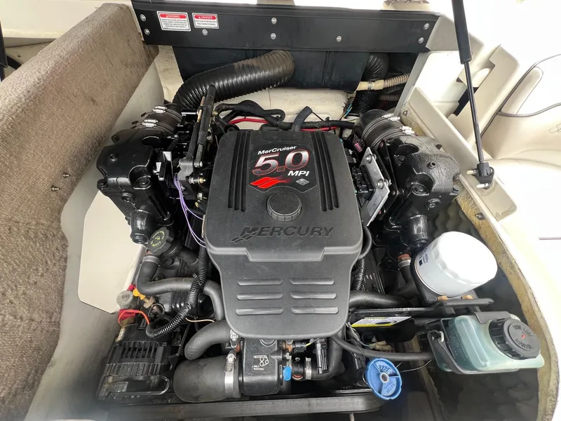 Slide: The Image of Engine compartment of a 2003 Sea Ray 200 Bow Rider with MerCruiser 5.0 MPI engine. - 22
