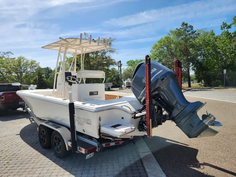 Slide: The Image of 2018 Pathfinder 2500 Hybrid boat on trailer with Yamaha outboard motor. - 11
