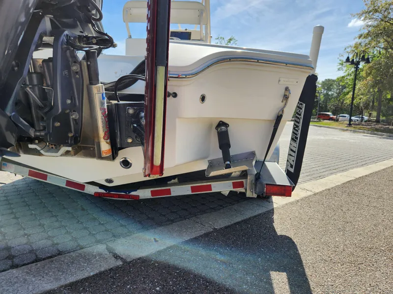 Slide: The Image of 2018 Pathfinder 2500 Hybrid boat on trailer, rear view, sunny day. - 15