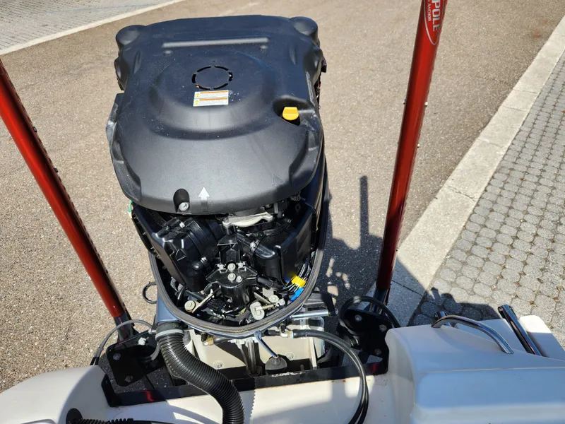 Slide: The Image of 2018 Pathfinder 2500 Hybrid boat engine, top view, with red support poles. - 17