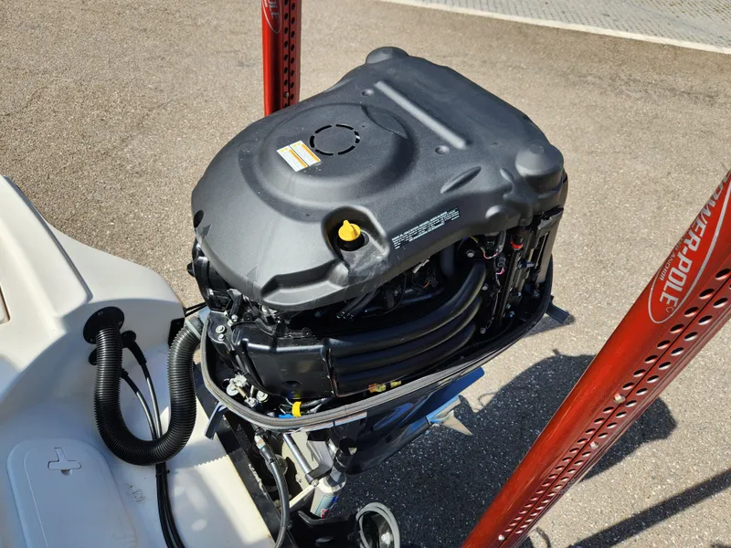 Slide: The Image of 2018 Pathfinder 2500 Hybrid boat engine with Power-Pole anchors on a sunny day. - 18