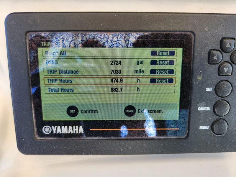 Slide: The Image of Yamaha display showing trip data: 2724 gallons, 7030 miles, 474.9 trip hours, 882.7 total hours. - 20