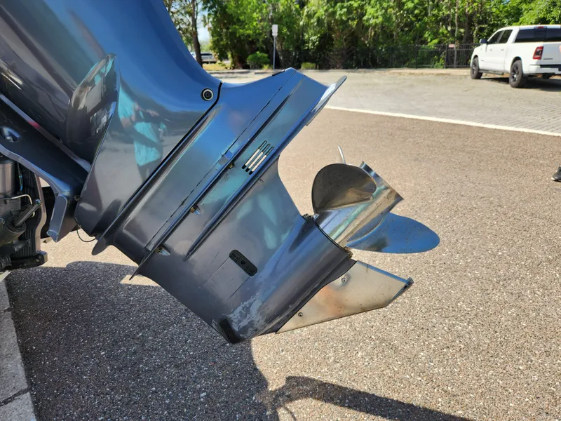 Slide: The Image of Outboard motor of a 2018 Pathfinder 2500 Hybrid boat on a sunny day. - 24