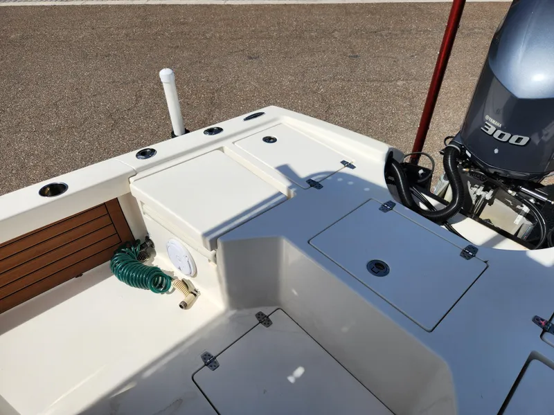 Slide: The Image of 2018 Pathfinder 2500 Hybrid boat deck with Yamaha 300 engine. - 28
