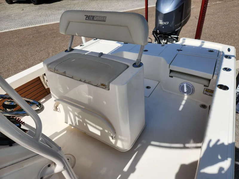 Slide: The Image of 2018 Pathfinder 2500 Hybrid boat interior with seating and motor. - 39