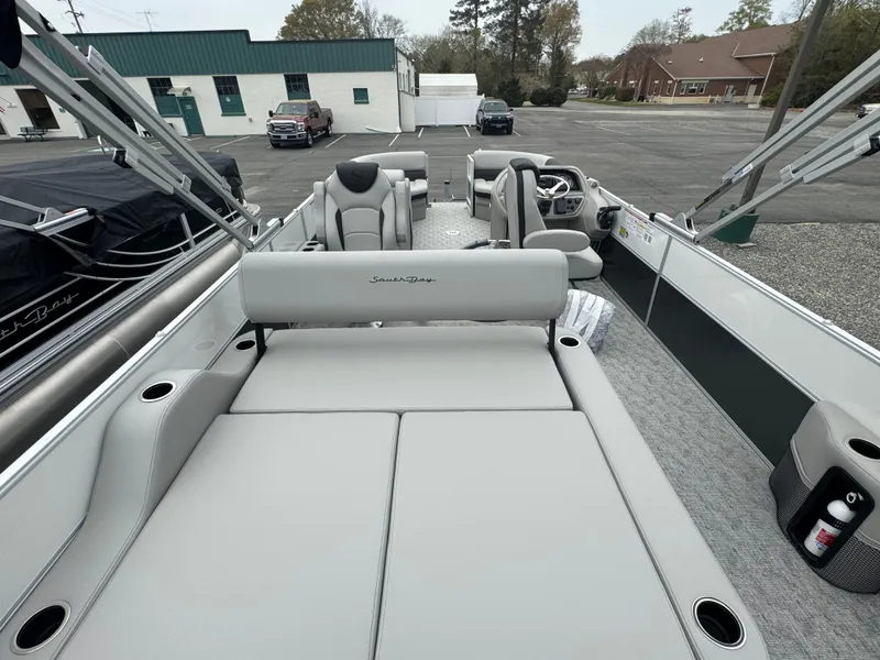 Slide: The Image of 2025 South Bay 224UL pontoon boat interior with spacious seating and modern design. - 15