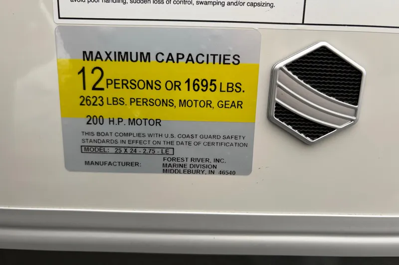 Slide: The Image of South Bay 224UL 2025 boat capacity label: 12 persons or 1695 lbs, 200 HP motor. - 31