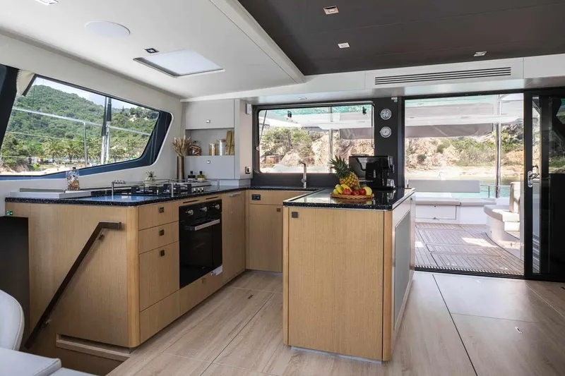 Slide: The Image of Luxurious 2025 Privilege Signature 580 yacht kitchen with modern design and scenic views. - 33