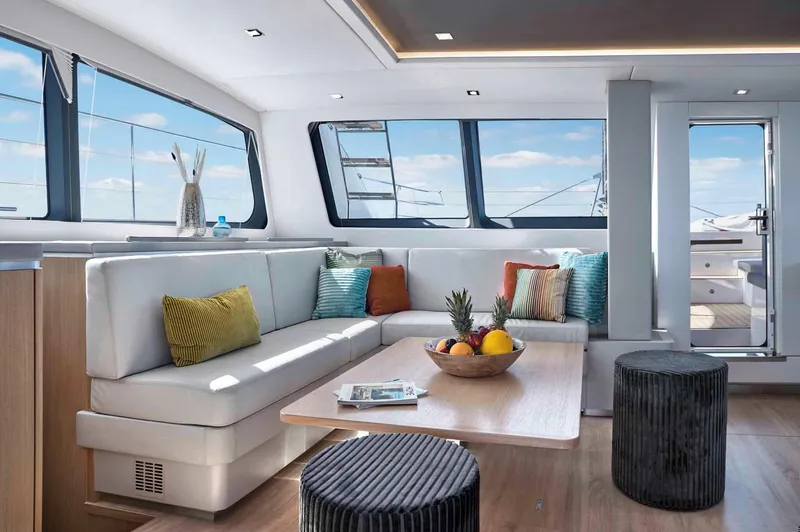 Slide: The Image of Luxurious interior of 2025 Privilege Signature 580 yacht with modern seating and decor. - 40
