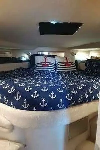 Slide: The Image of Bathroom interior of 1993 Sea Ray 400 Sundancer yacht, featuring sink and toilet. - 11