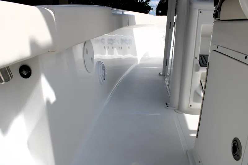 Slide: The Image of 2022 Sea Hunt Gamefish 27 interior, featuring sleek white deck and modern design elements. - 29