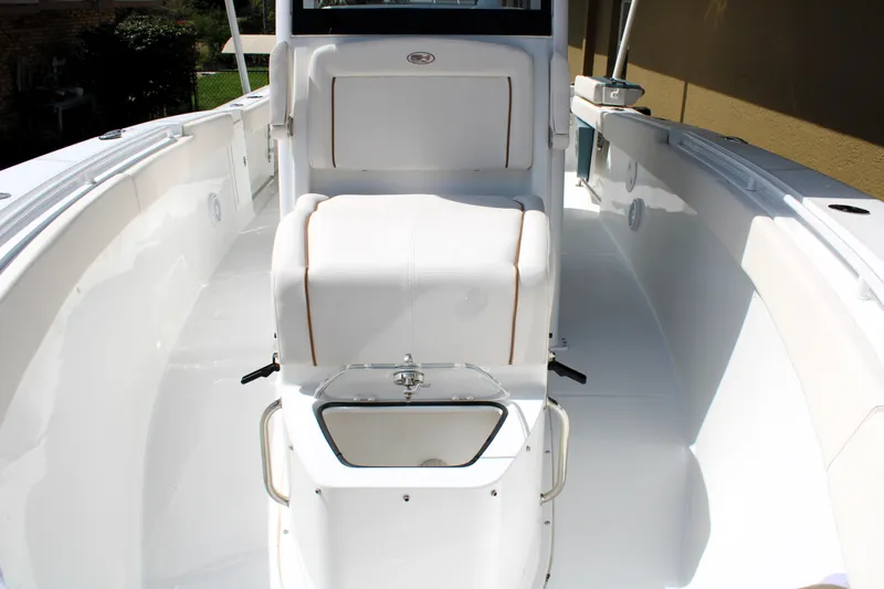 Slide: The Image of 2022 Sea Hunt Gamefish 27 boat interior with coffin box seating. - 33