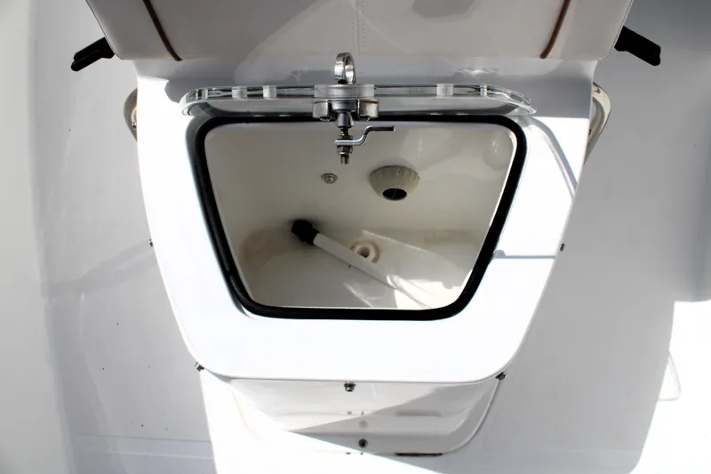 Slide: The Image of 2022 Sea Hunt Gamefish 27 Coffin Box interior, open lid, white finish. - 34