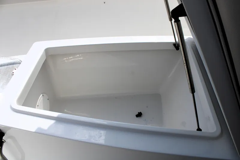 Slide: The Image of 2022 Sea Hunt Gamefish 27 Coffin Box interior view, showcasing spacious storage. - 36