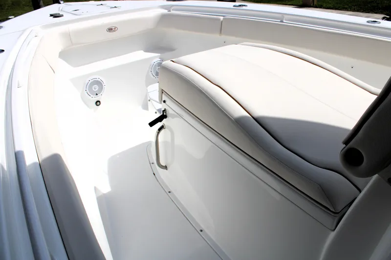 Slide: The Image of 2022 Sea Hunt Gamefish 27 interior with coffin box seating and speakers. - 4