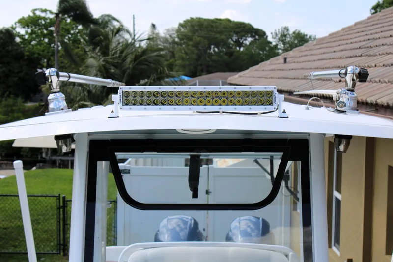 Slide: The Image of 2022 Sea Hunt Gamefish 27 boat with LED light bar and radar equipment. - 40