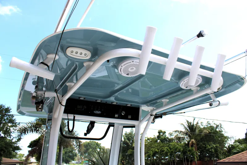 Slide: The Image of 2022 Sea Hunt Gamefish 27 T-top with rod holders and speakers. - 41