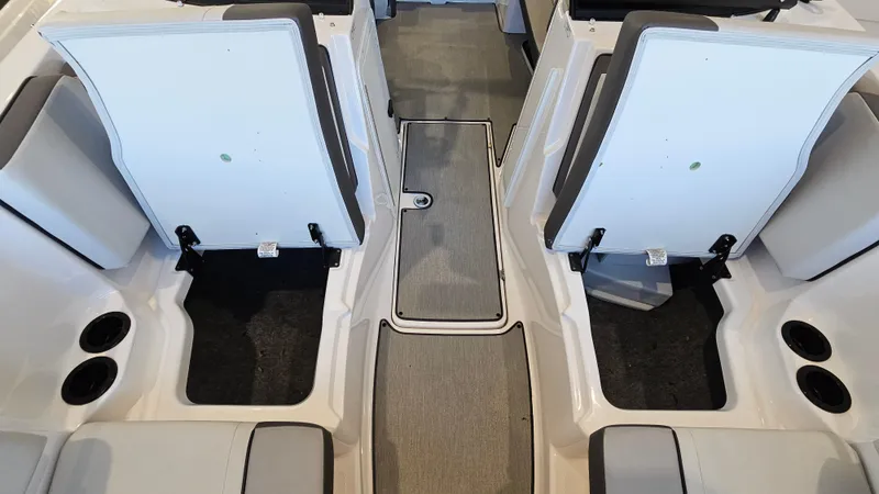 Slide: The Image of 2023 Yamaha Boats AR220 interior seating and storage compartments. - 21