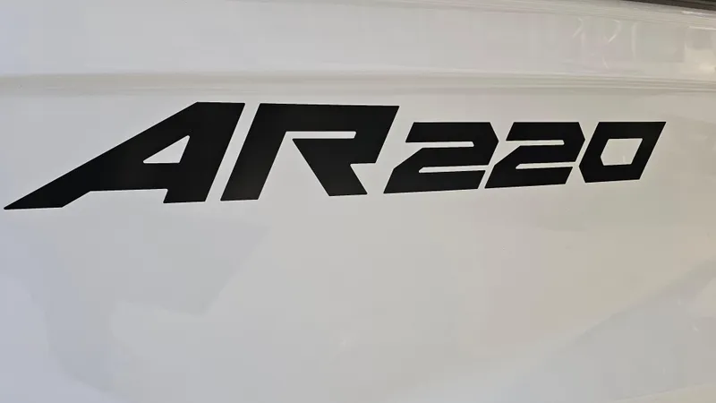 Slide: The Image of 2023 Yamaha Boats AR220 logo on white surface. - 27