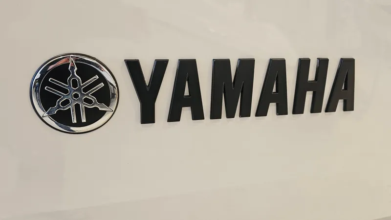 Slide: The Image of Yamaha logo on 2023 AR220 boat, featuring sleek design and branding. - 28