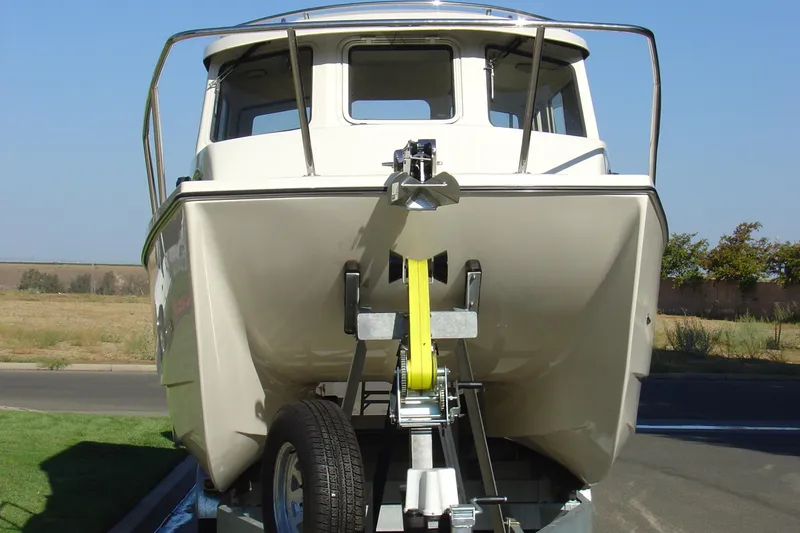 Slide: The Image of 2008 C-Dory 255 TOMCAT boat on trailer, front view. - 10