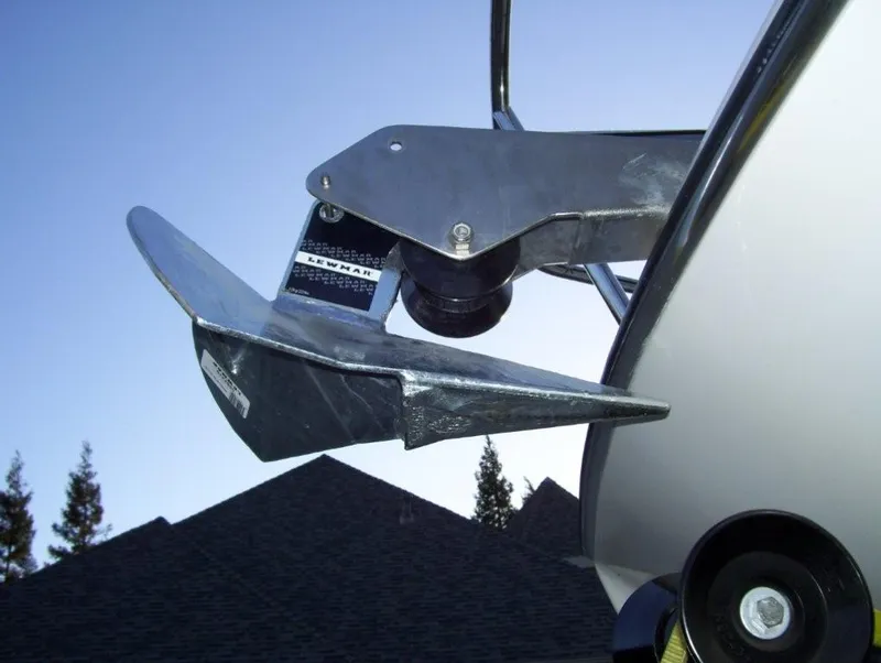 Slide: The Image of 2008 C-Dory 255 TOMCAT anchor detail against clear sky. - 11