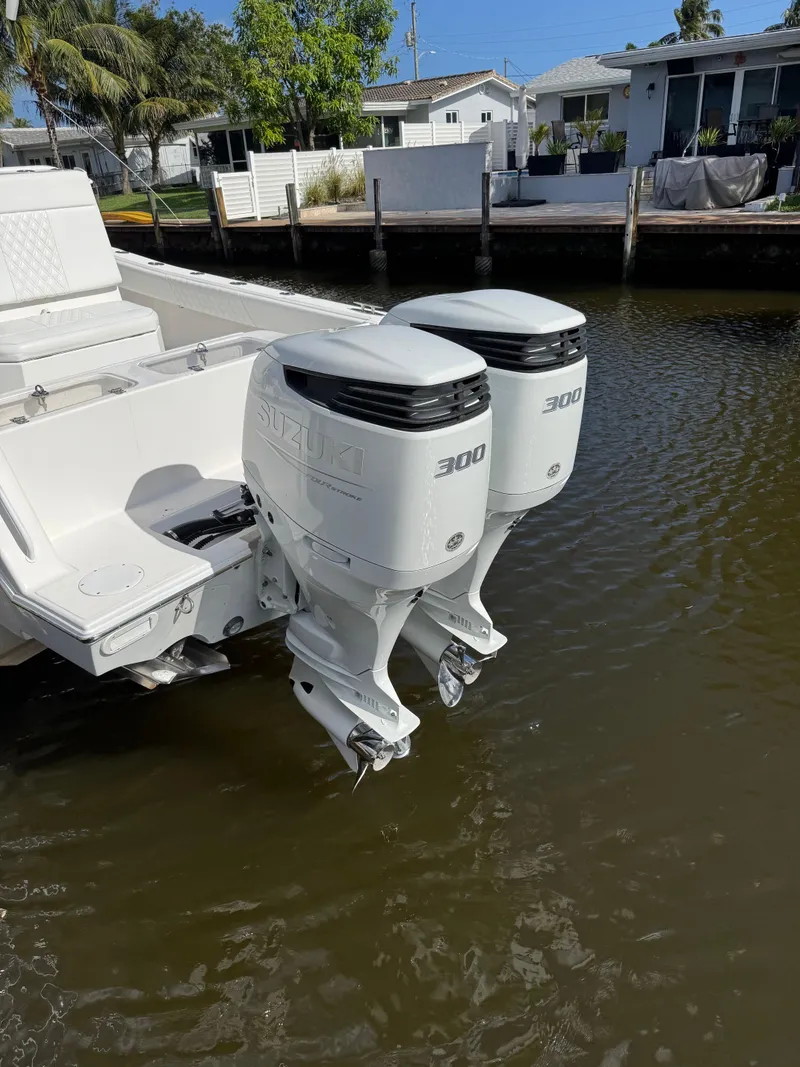 Slide: The Image of Twin Suzuki 300 outboard engines on a 2021 Ocean Runner 2900 CC boat. - 6