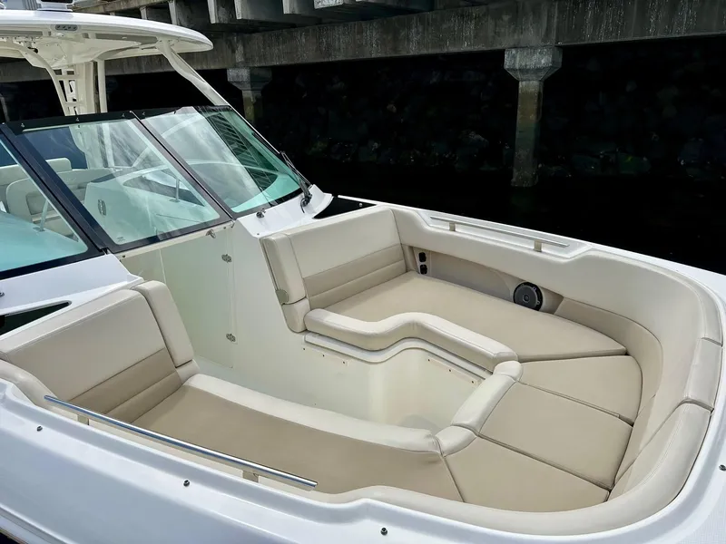 Slide: The Image of 2016 Boston Whaler 320 Vantage boat with spacious seating and sleek design. - 27