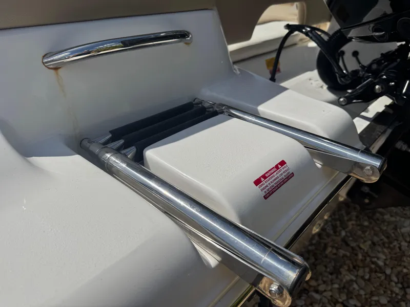 Slide: The Image of 2019 Key West 189 FS boat ladder with stainless steel handles. - 18