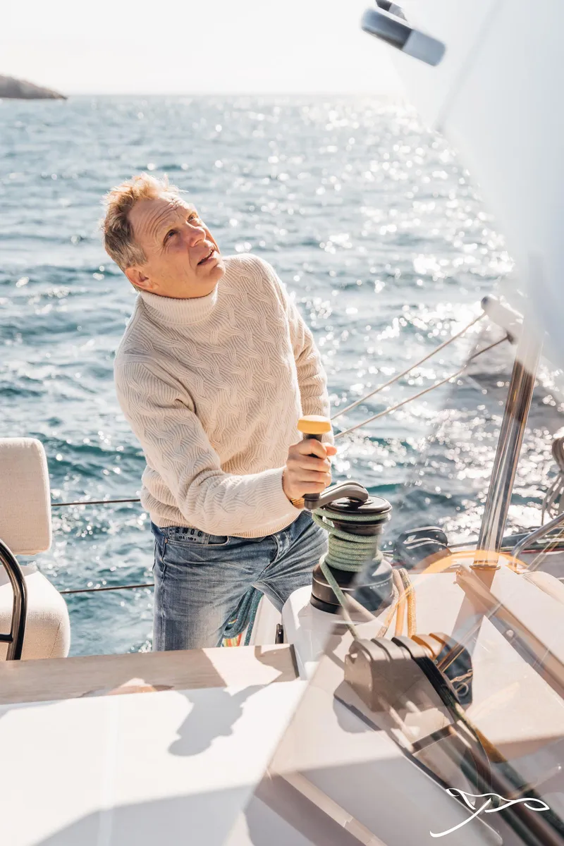 Slide: The Image of Man sailing Nautitech 44 Open yacht, 2025 model, on sunny ocean day. - 20