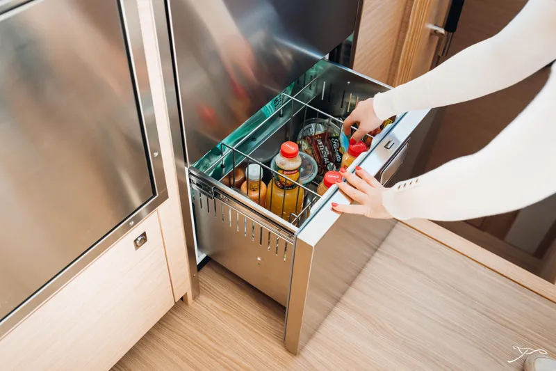 Slide: The Image of Modern kitchen drawer with beverages on Nautitech 44 Open, 2025 model yacht. - 36