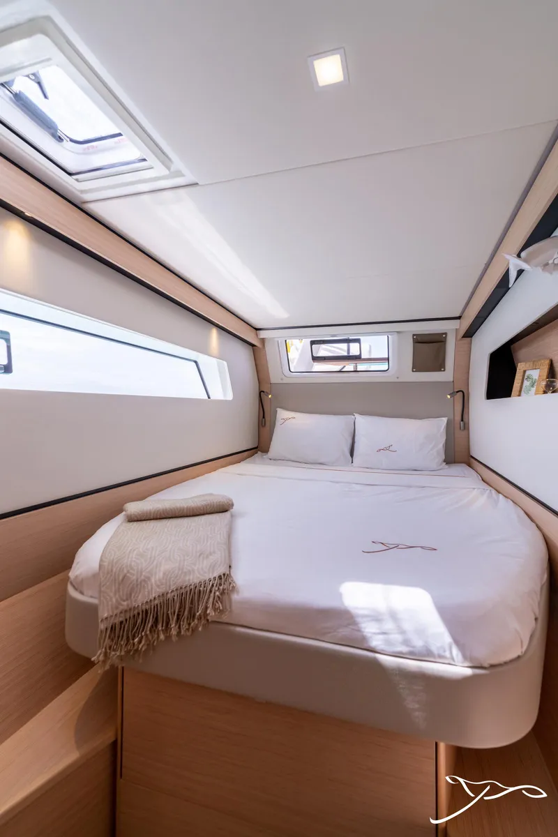 Slide: The Image of Luxurious cabin interior of 2025 Nautitech 44 Open yacht with cozy bedding. - 46