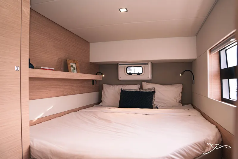 Slide: The Image of Cozy bedroom in 2025 Nautitech 40 Open yacht with modern design and natural light. - 44