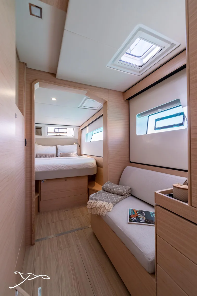 Slide: The Image of Interior of 2025 Nautitech 44 Open yacht, featuring a cozy cabin with modern furnishings. - 42