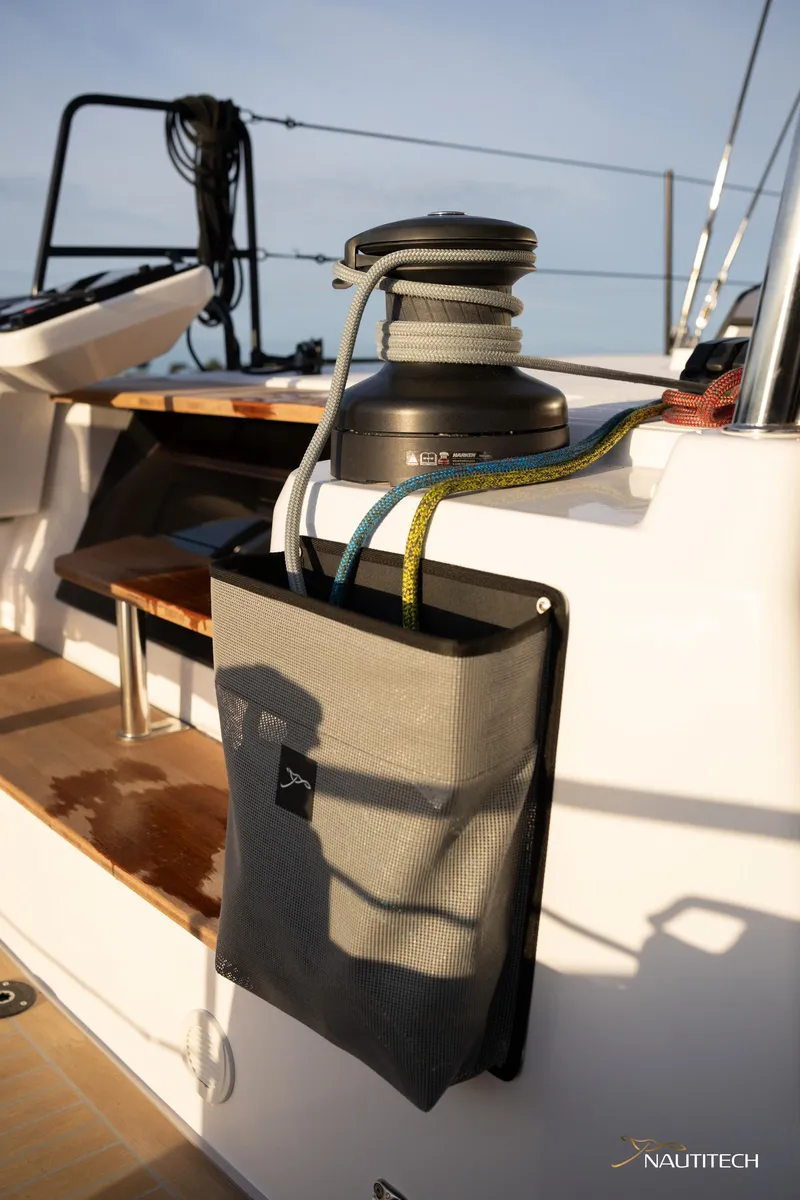 Slide: The Image of 2025 Nautitech 48 Open yacht deck with winch and rope storage. - 35