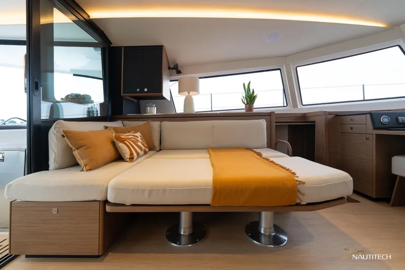 Slide: The Image of Luxurious interior of 2025 Nautitech 48 Open catamaran with modern seating and decor. - 39