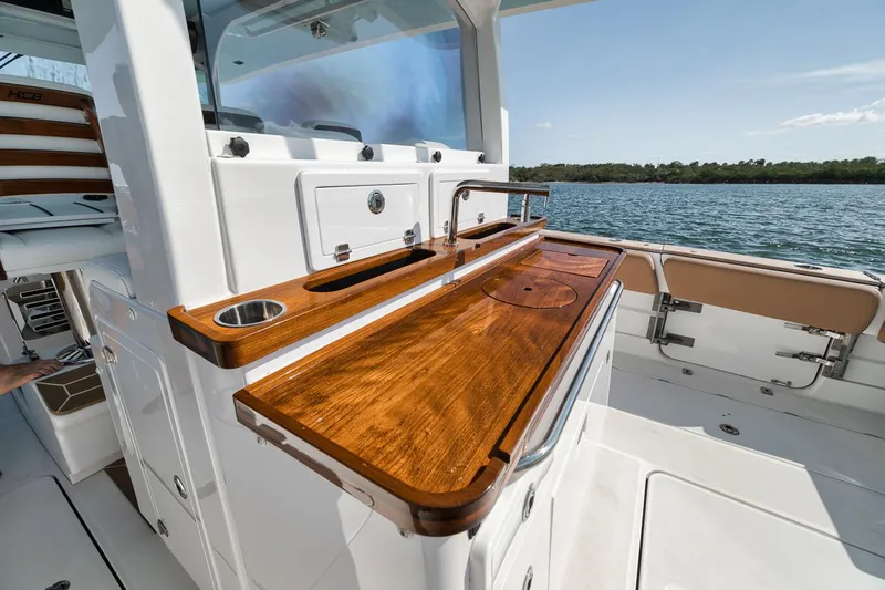 Slide: The Image of Luxury 2022 HCB Lujo boat with elegant wooden deck and modern amenities. - 29