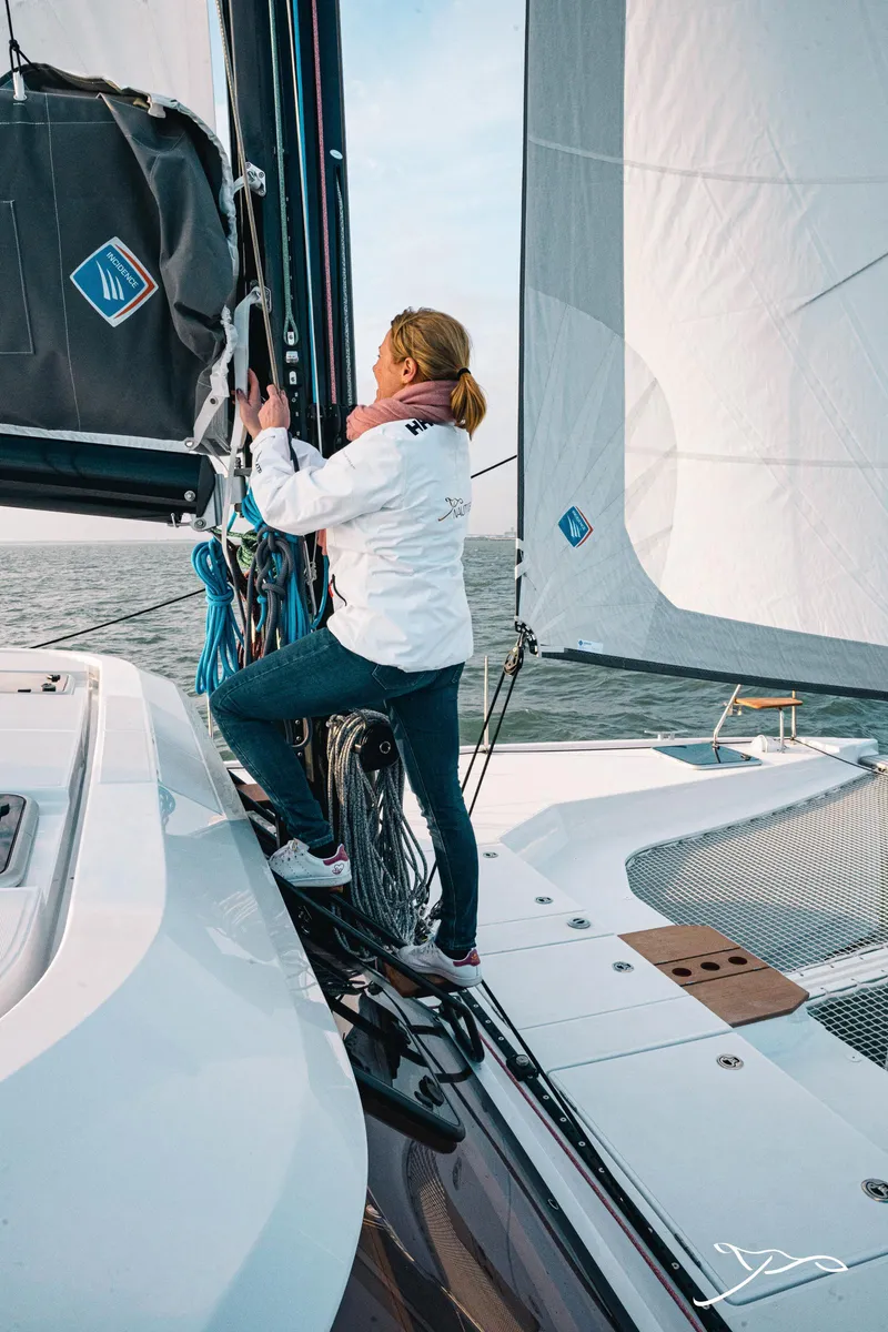 Slide: The Image of Person sailing on a 2025 Nautitech 40 Open catamaran. - 19