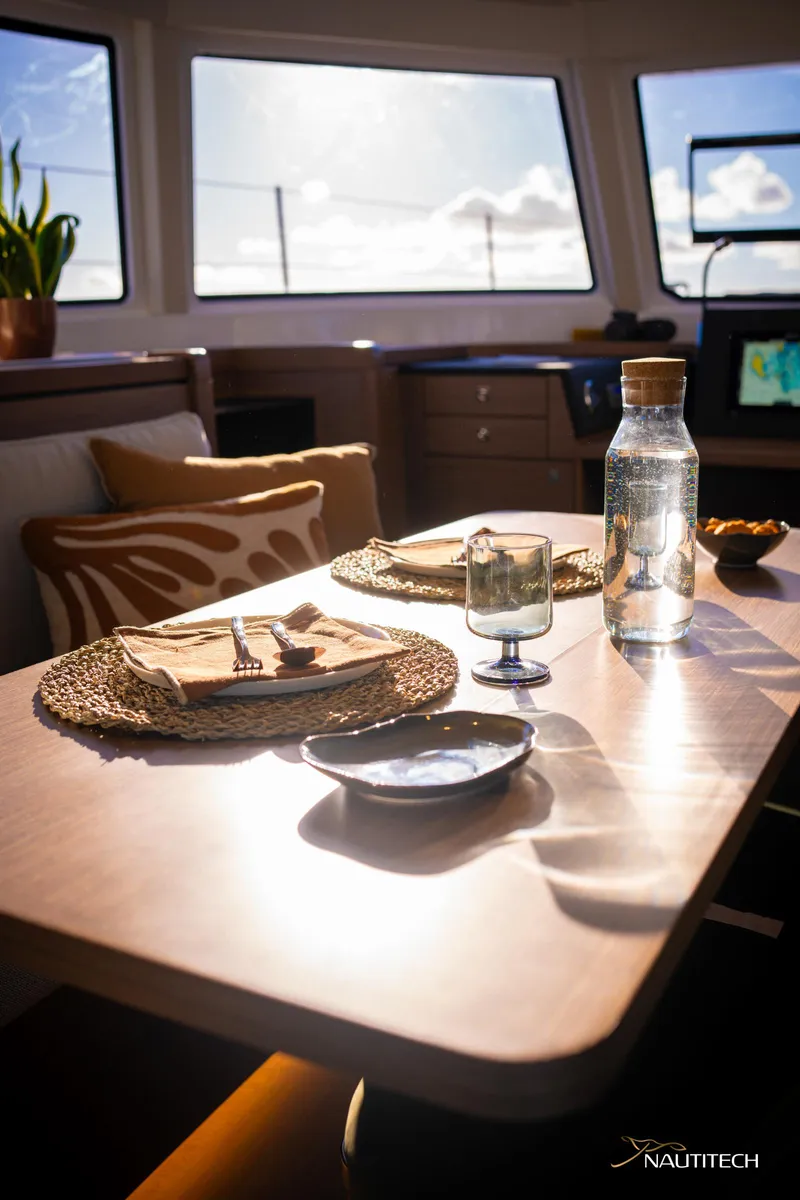 Slide: The Image of Interior of 2025 Nautitech 48 Open yacht with elegant dining setup. - 41