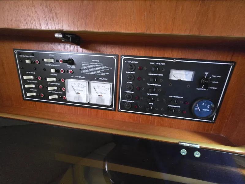 Slide: The Image of Electrical control panel on a 2006 Pursuit 3370 Offshore boat. - 20